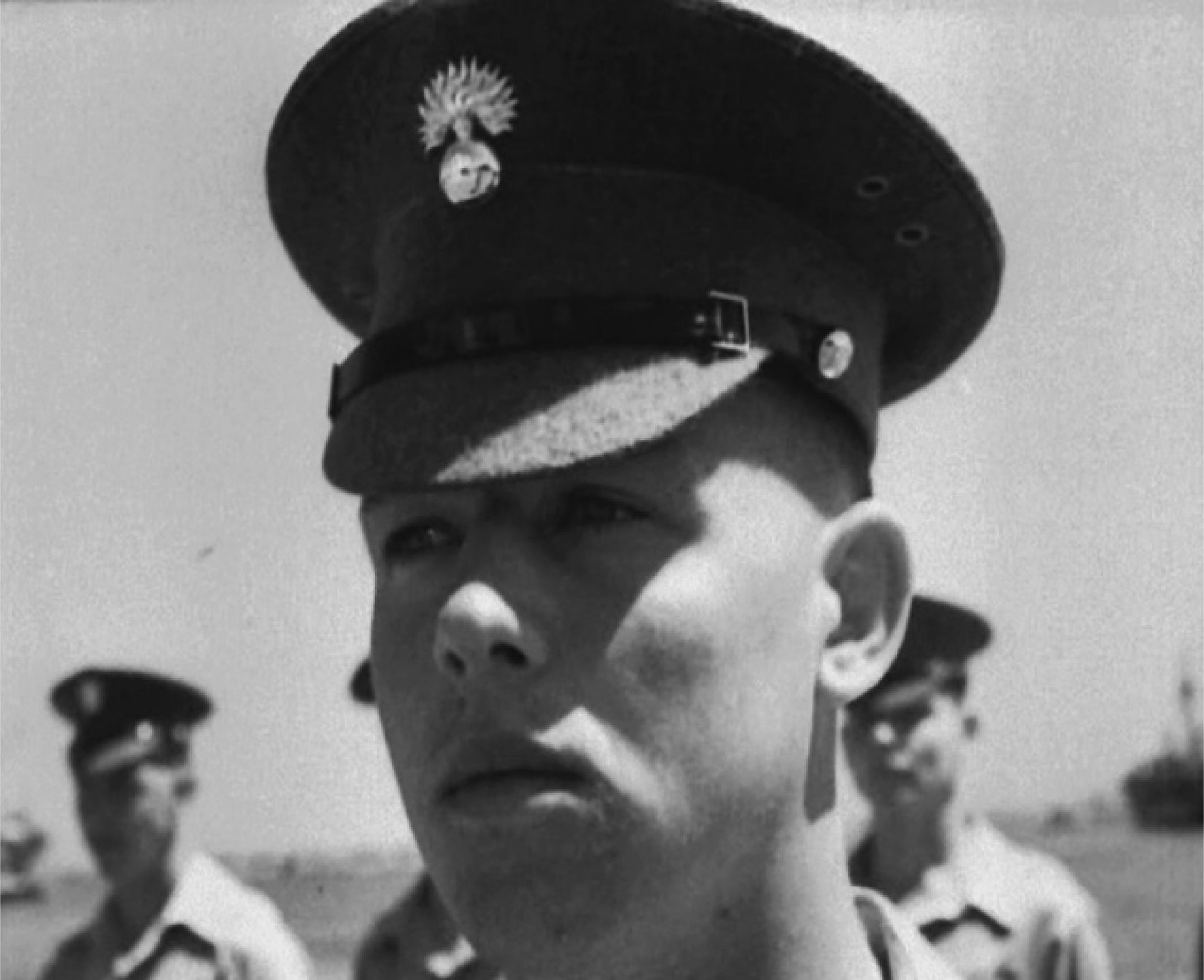 Personalized shot of a British soldier being saluted by General Alan Cunningham before leaving Palestine, from Palestine Defies Solution (1948). Image supplied by British Pathé.