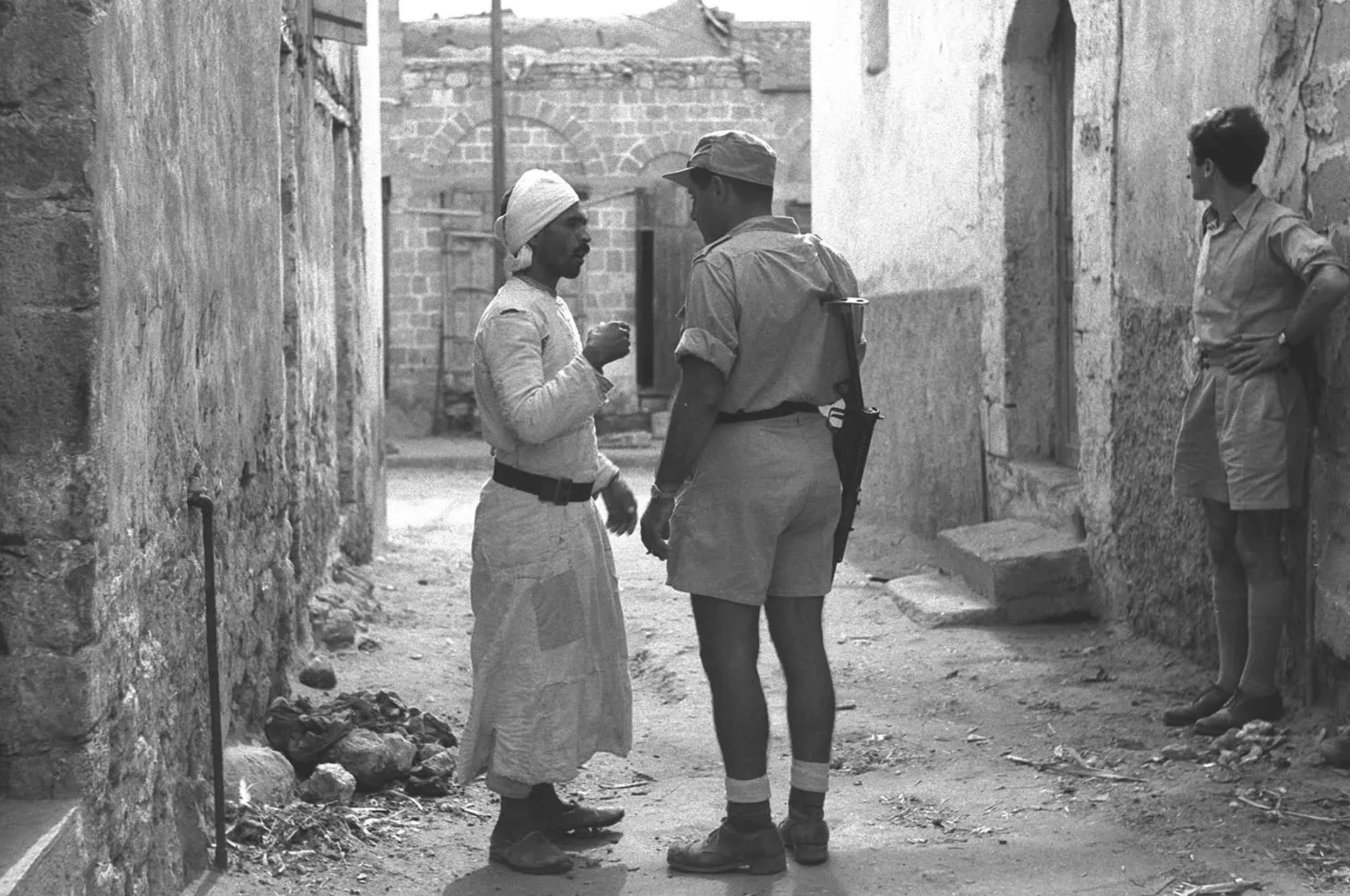 A black and white photograph taken in Al-Majdal Asqalan - Gaza: Soon after occupying the city but before expelling the indigenous Palestinian Arab population, Nov. 1948