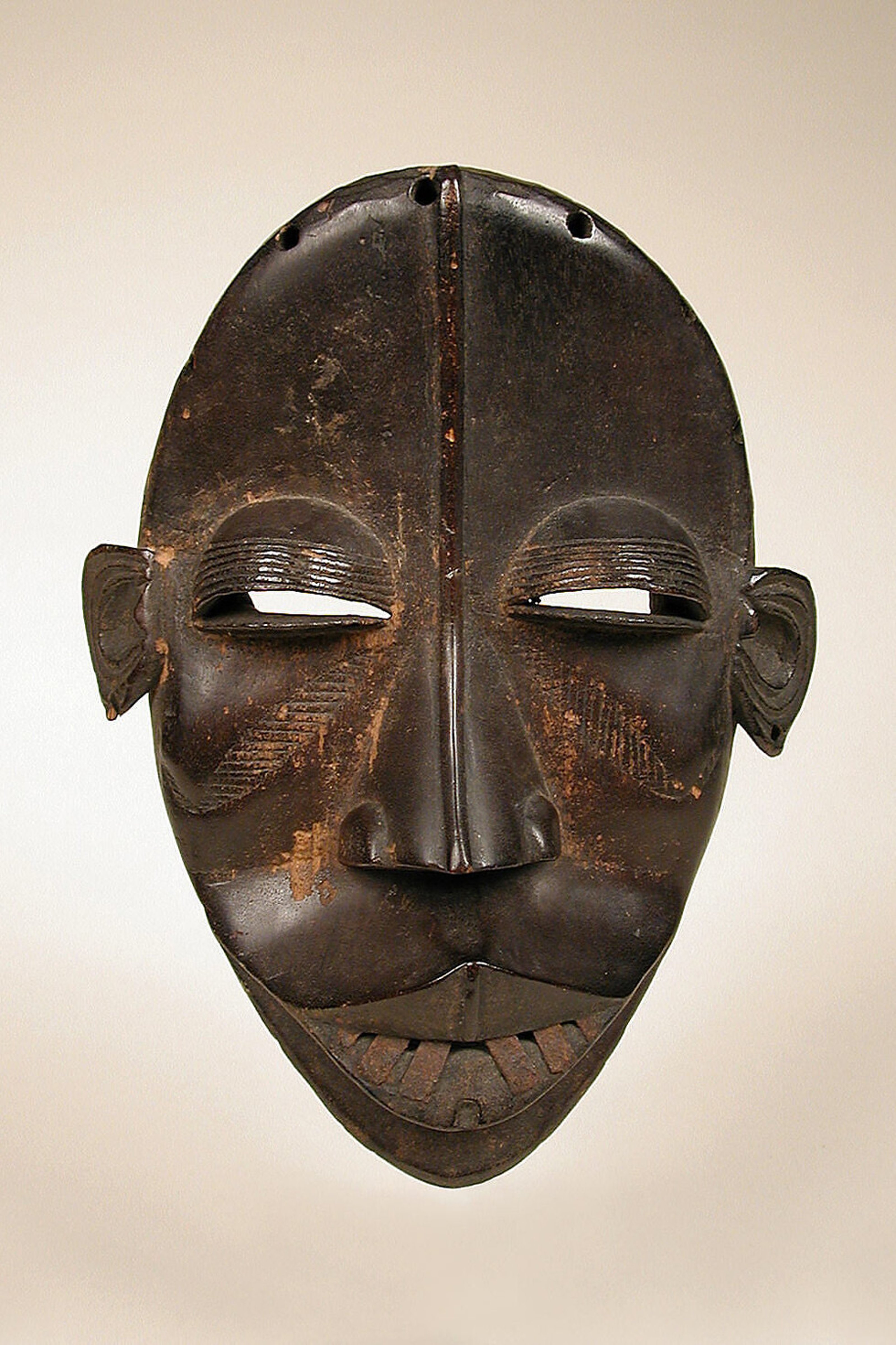 African face mask made of wood.