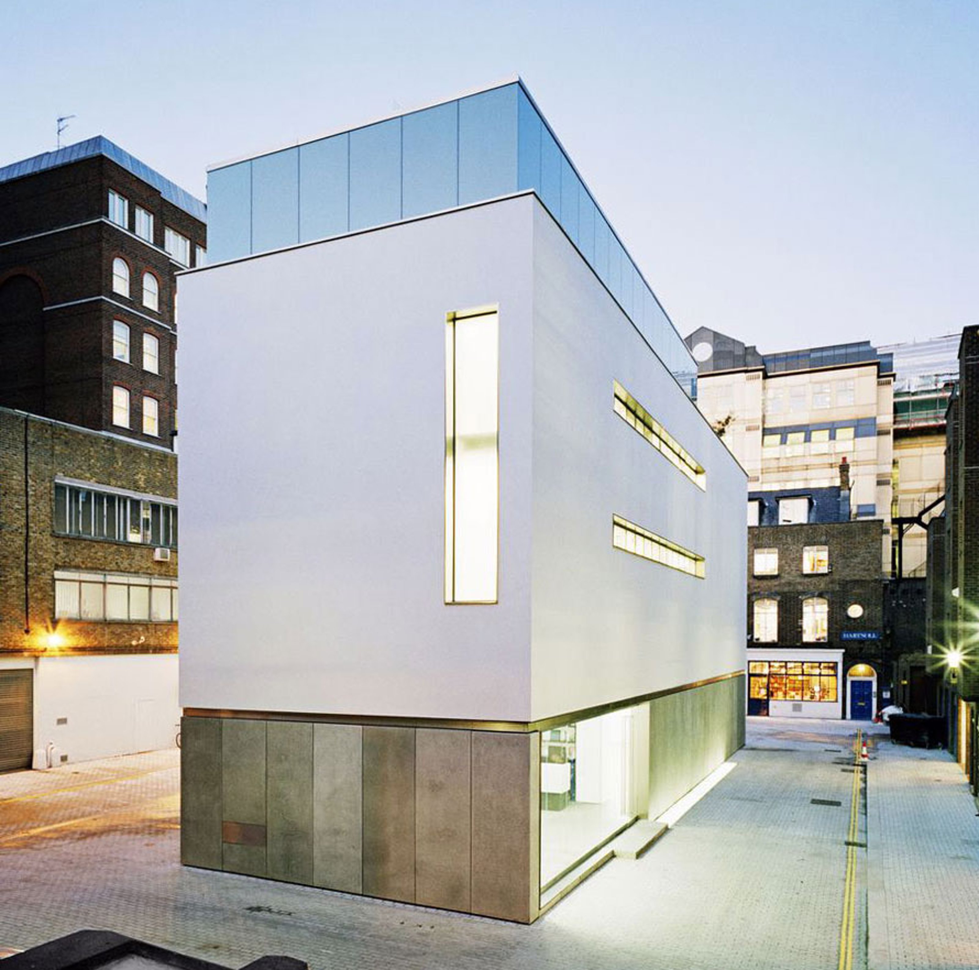 Exterior view of a modern white-walled building in St James's London.