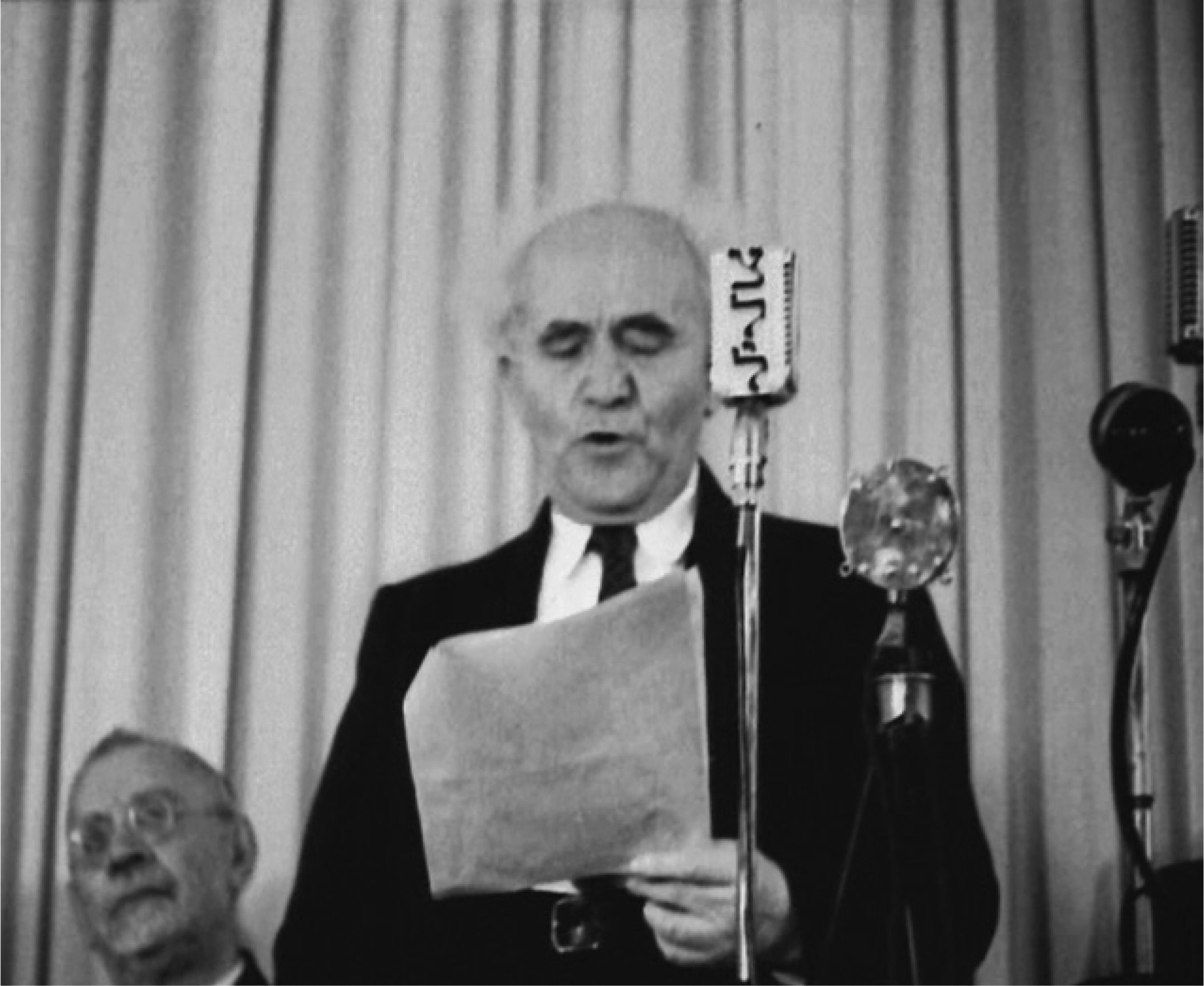 David Ben Gurion reading Israel’s Proclamation of Independence on May 15, 1948, from Palestine Defies Solution. Image supplied by British Pathé.