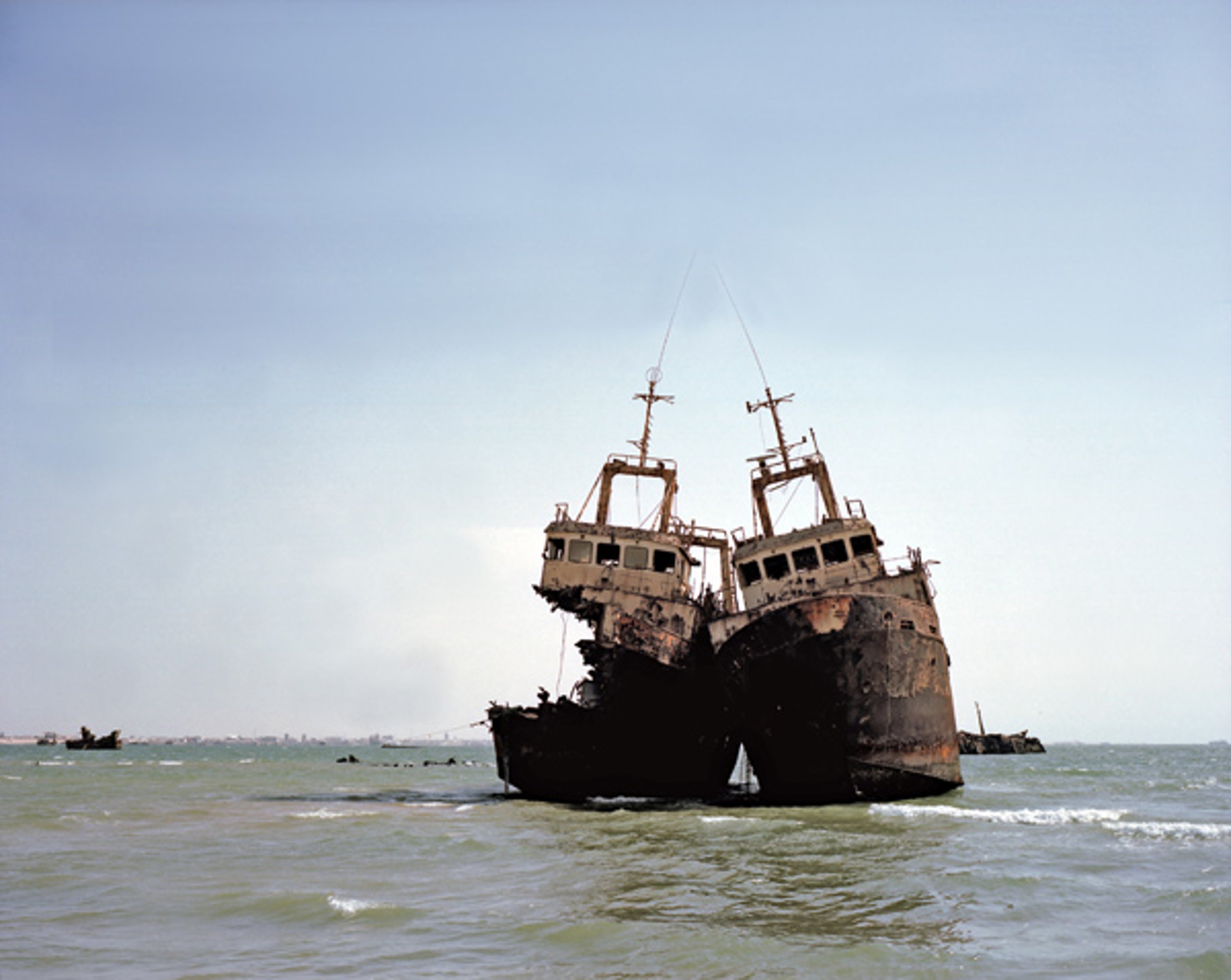 The Lovers (teo damaged ships leaning on each other on water), 2008 courtesy kamel mennour, Paris/London