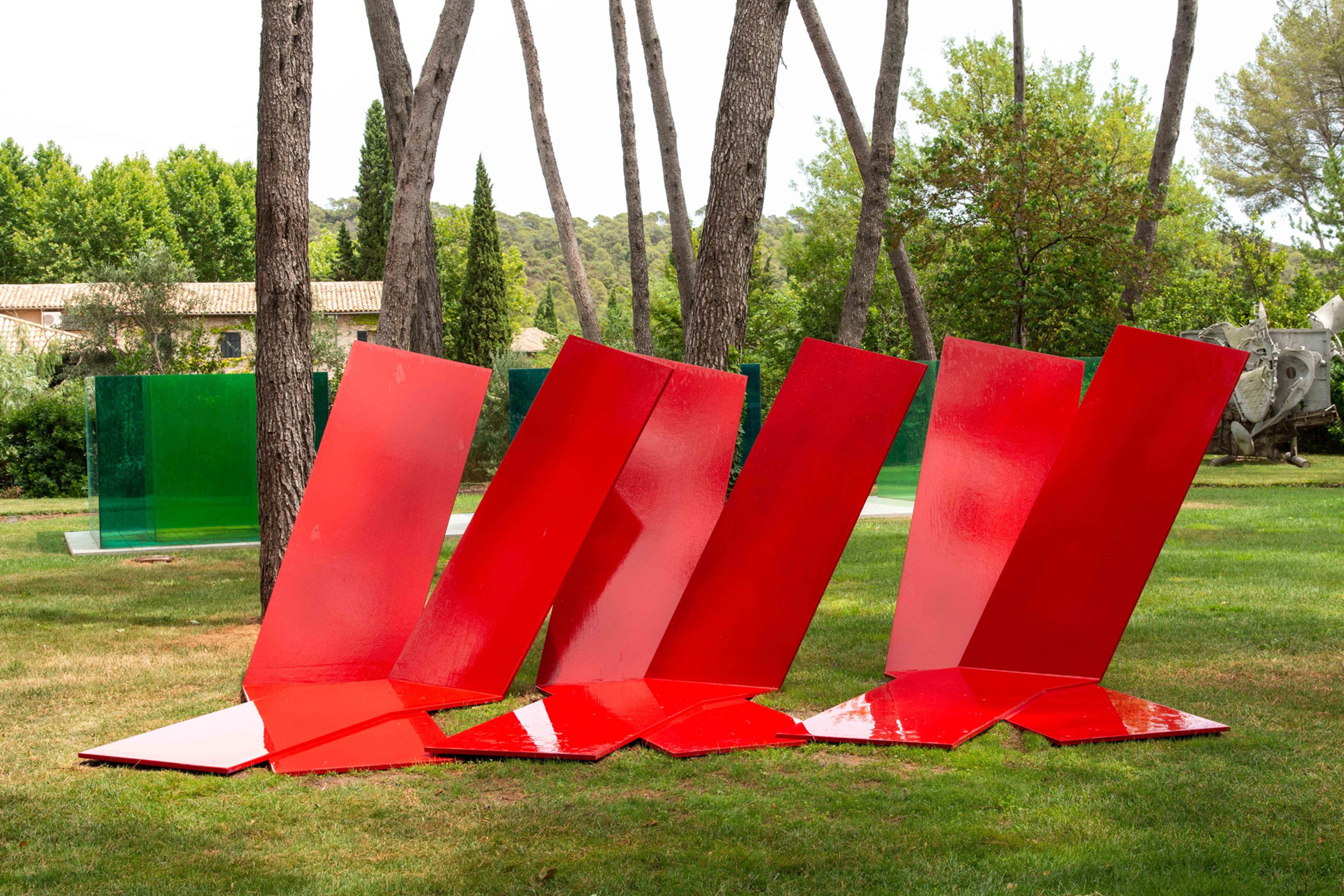 red painted steel on grass