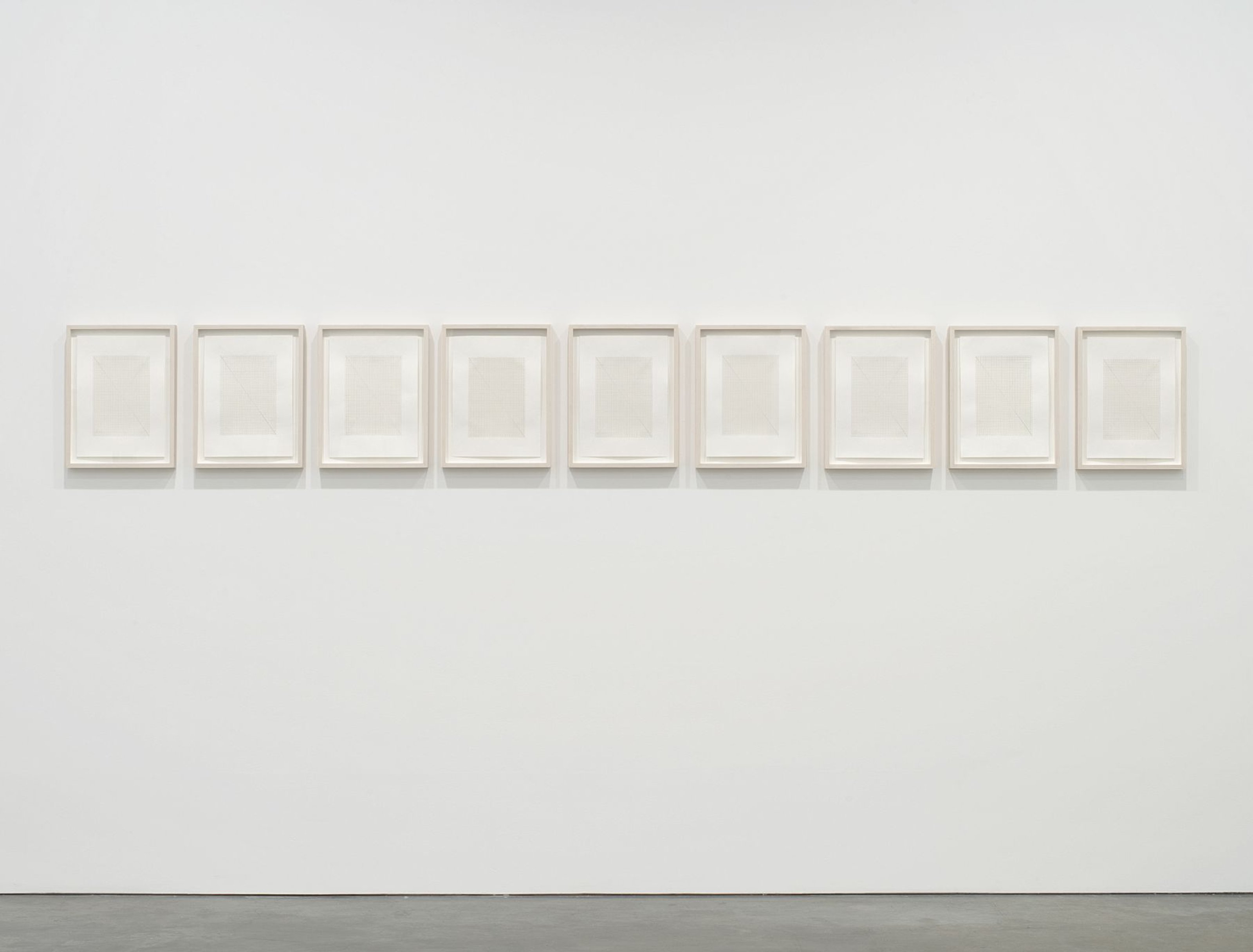 Image showing nine framed papers with hand-drawn graphs showing a decine of T-cells