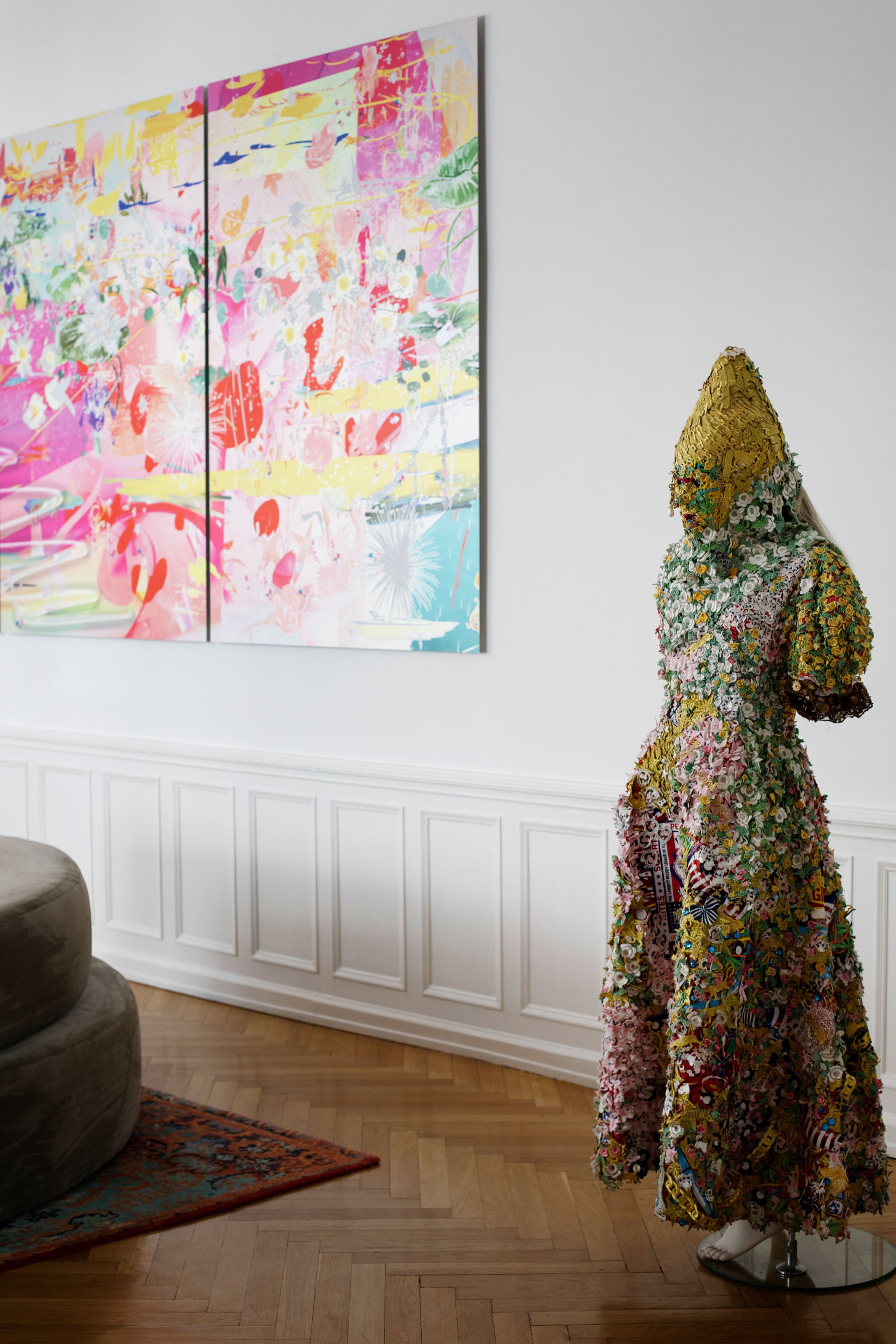 Interior of Giovanni Springmeier's home, showing two artworks from his art collection