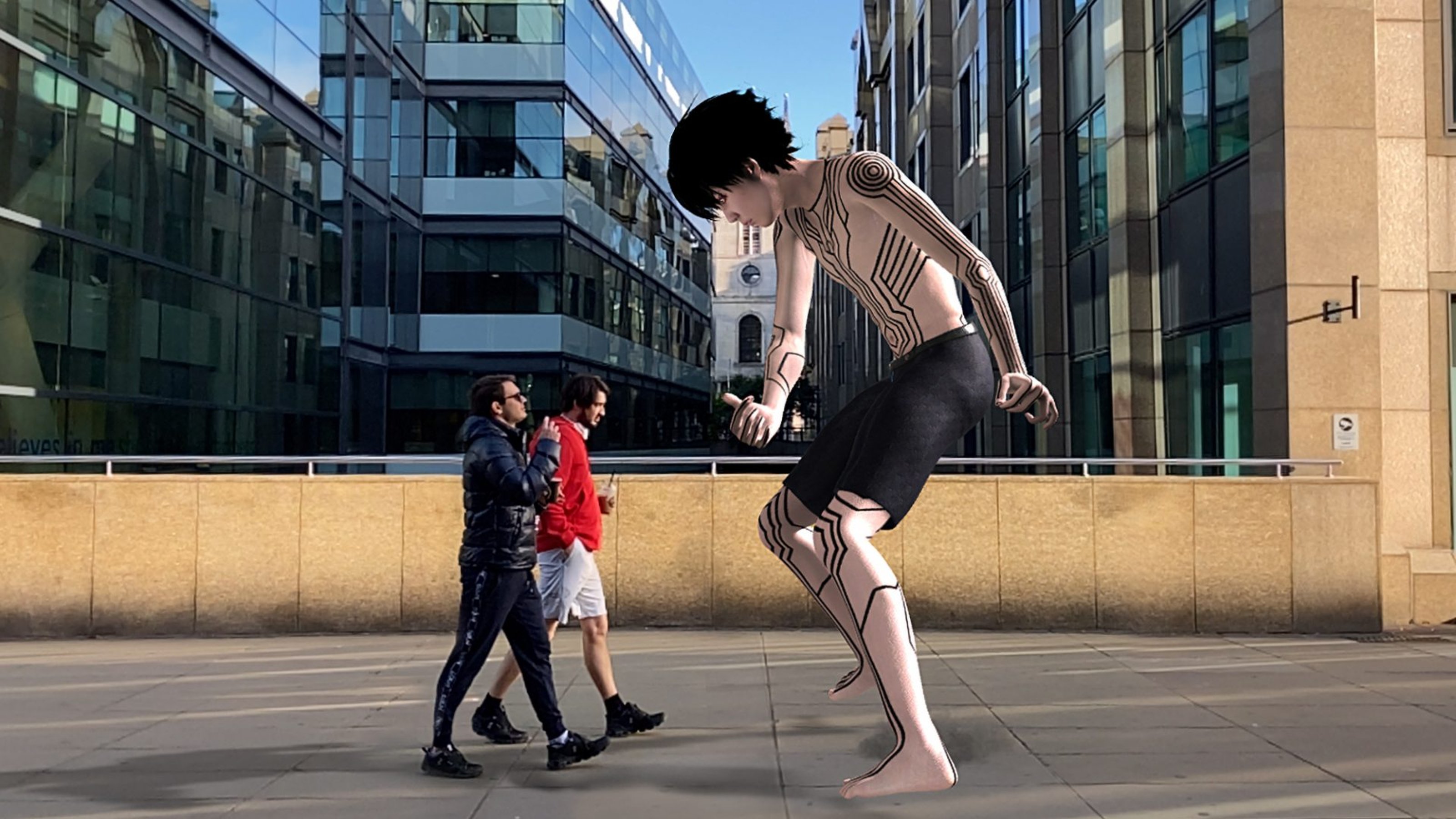A giant digital figure in front of two people walking on the street